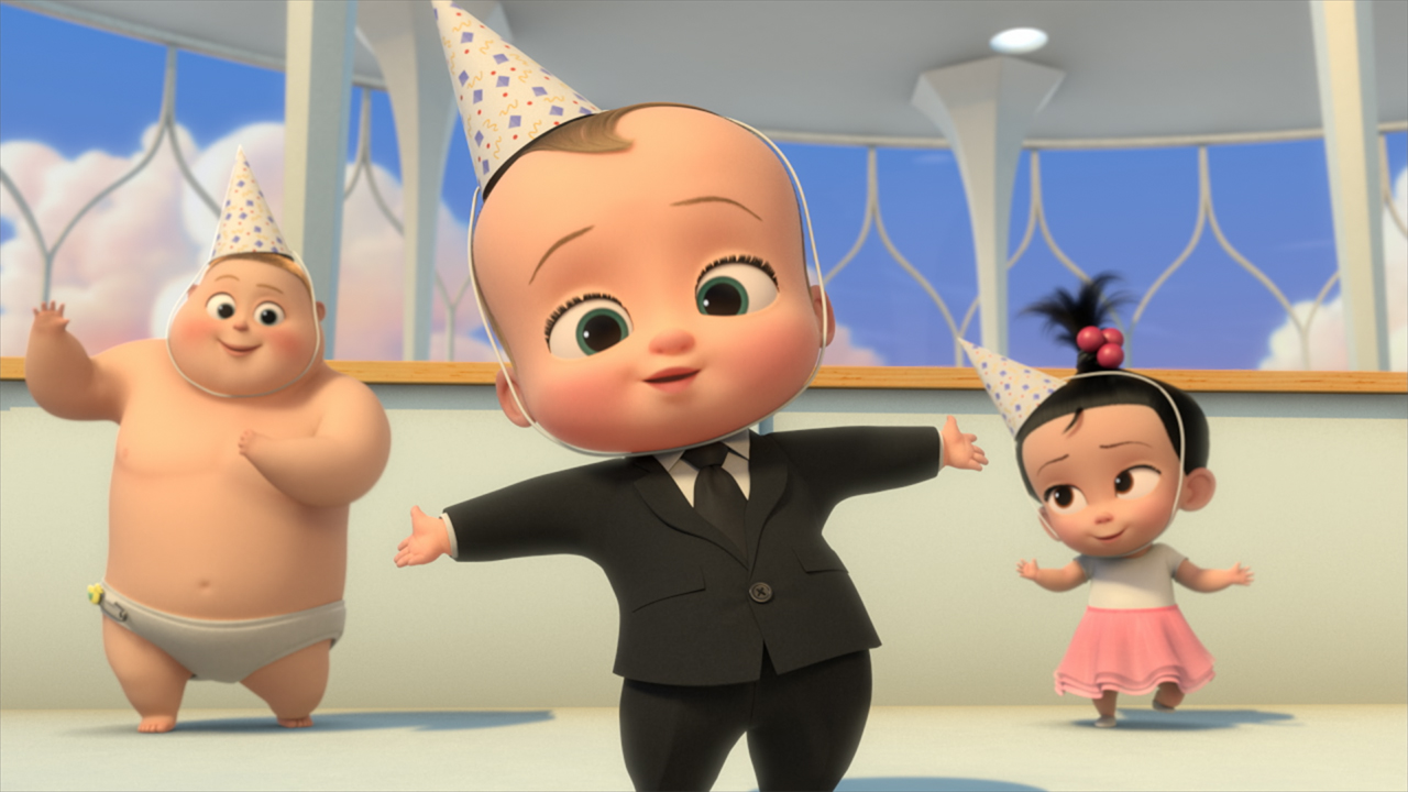 an animated baby wearing a business suit and a birthday hat dances with his friends