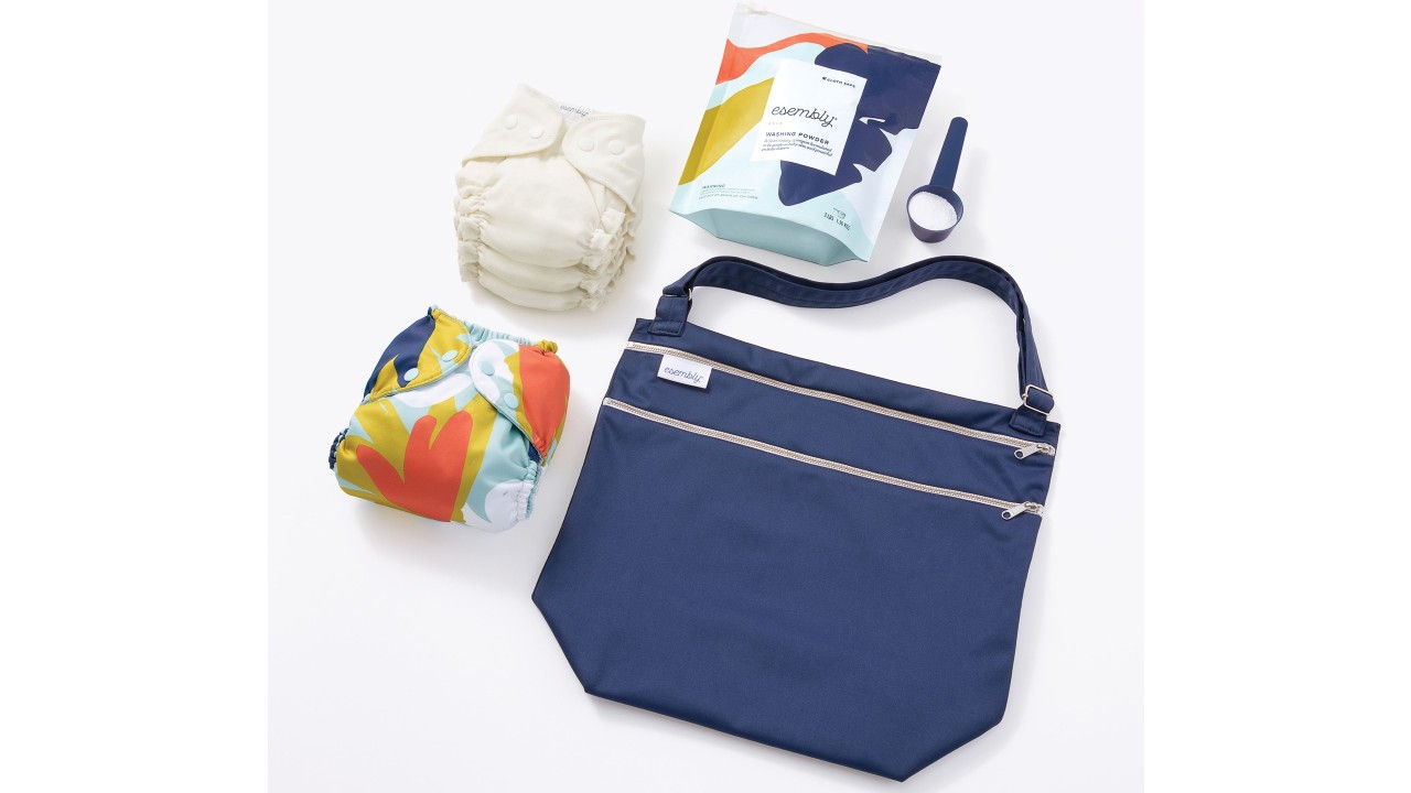 bag with reusable diapers and laundry powder